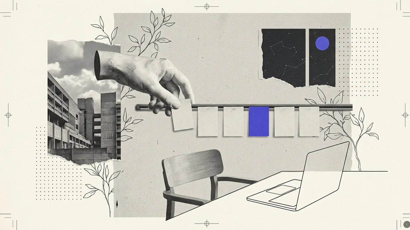 An empty chair and a closed laptop at a desk. Above them a plaster hand moves blank cards along a rail on the wall, one card blue-violet, beside a window showing night sky.