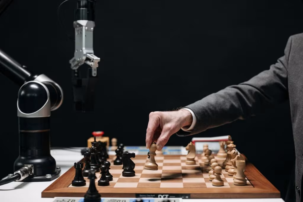 Agentic AI in Marketing Mix Modeling: Autonomous Budget Optimization A robotic arm plays chess against a human, symbolizing AI innovation and strategy - agentic ai marketing mix modeling
